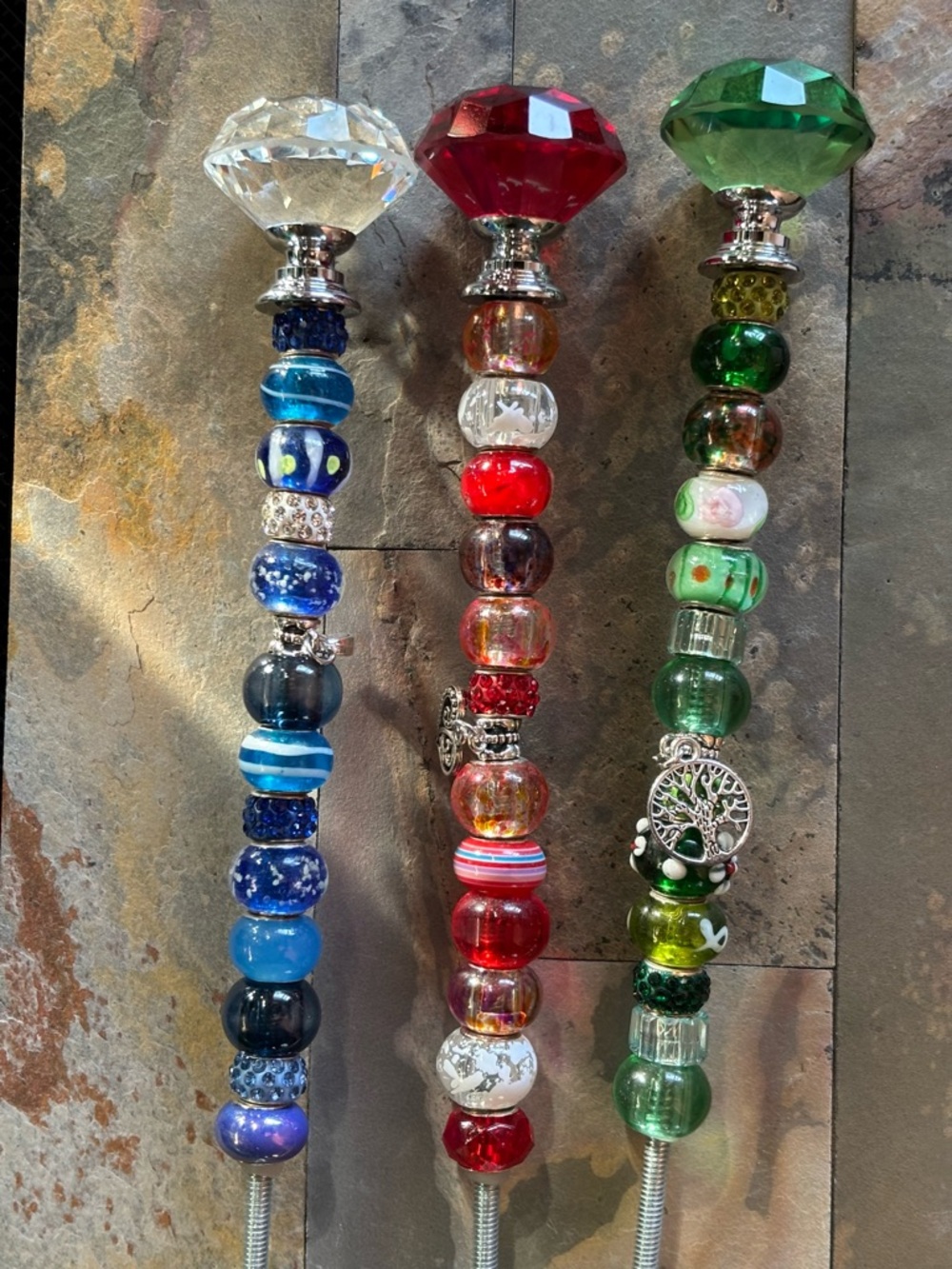 1 plant stake, decorative beads for enhance plants or flower pots.